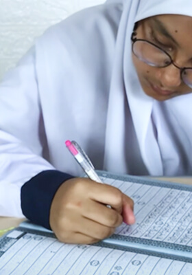 Menulis Al-Qur'an